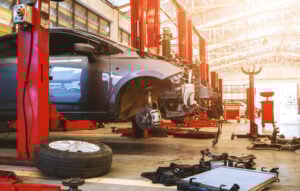 Car,In,Automobile,Repair,Service,Center,With,Soft focus,And,Over