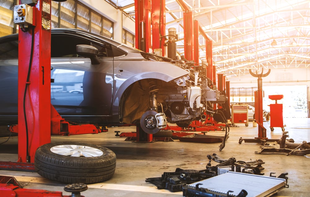 Car,In,Automobile,Repair,Service,Center,With,Soft focus,And,Over